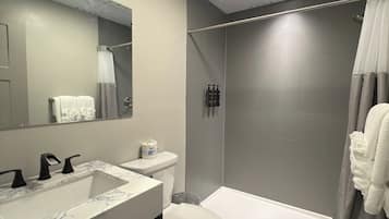 Hair dryer, towels, soap, shampoo