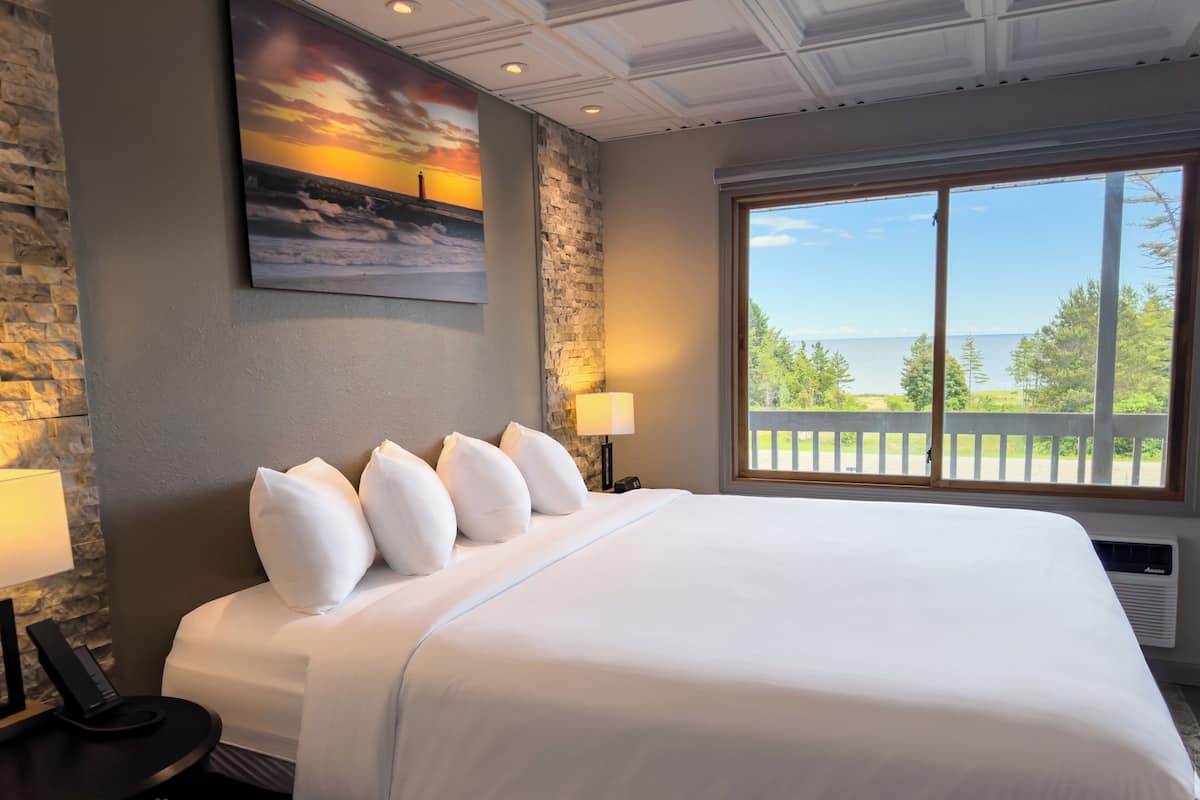 Room, 1 King Bed, Lake View | Desk, laptop workspace, iron/ironing board, WiFi (free)
