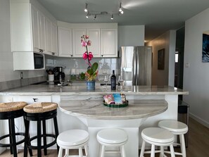 Fridge, microwave, oven, stovetop - Puako Penthouse 409 ~ Top Floor Unit ~ Pool (Kamuela)
