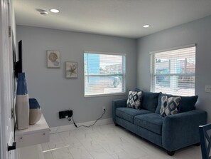 Living area - Blue Tide Retreat, Walk to Beach, Perfect for Long Term Stays! (Madeira Beach)