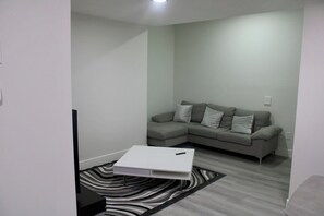 Living area - Stylish 2-Bed Basement Suite by West Edmonton Mall (Edmonton)