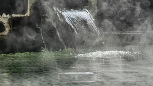 A water feature with a stone wall and a tiled floor. - turuyaryokan (Yamanouchi)