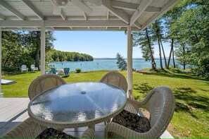 Outdoor dining - Lakefront living with sunset views in S. Hero VT (Montego Bay)