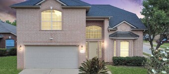 Family retreat with game room and huge yard.