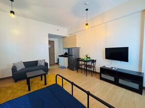 Living area - Beirut Bliss Suite - Cozy Staycation near SM Trece  WiFi + Netflix + Kitchen (Trece Martires City)