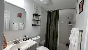 Hair dryer, towels, soap, shampoo