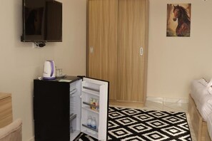 Camera tripla, vista montagna | Interni