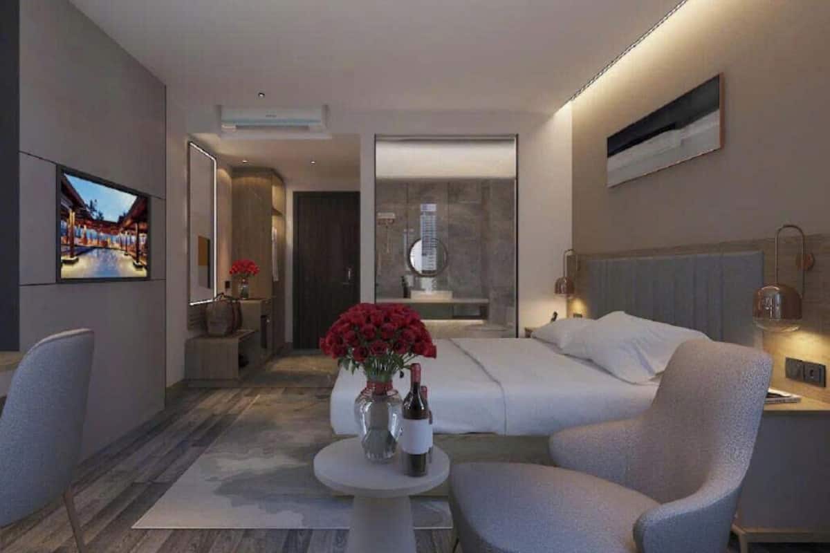 Deluxe-Doppelzimmer, Stadtblick | Zimmersafe, Verdunkelungsvorhänge, kostenloses WLAN