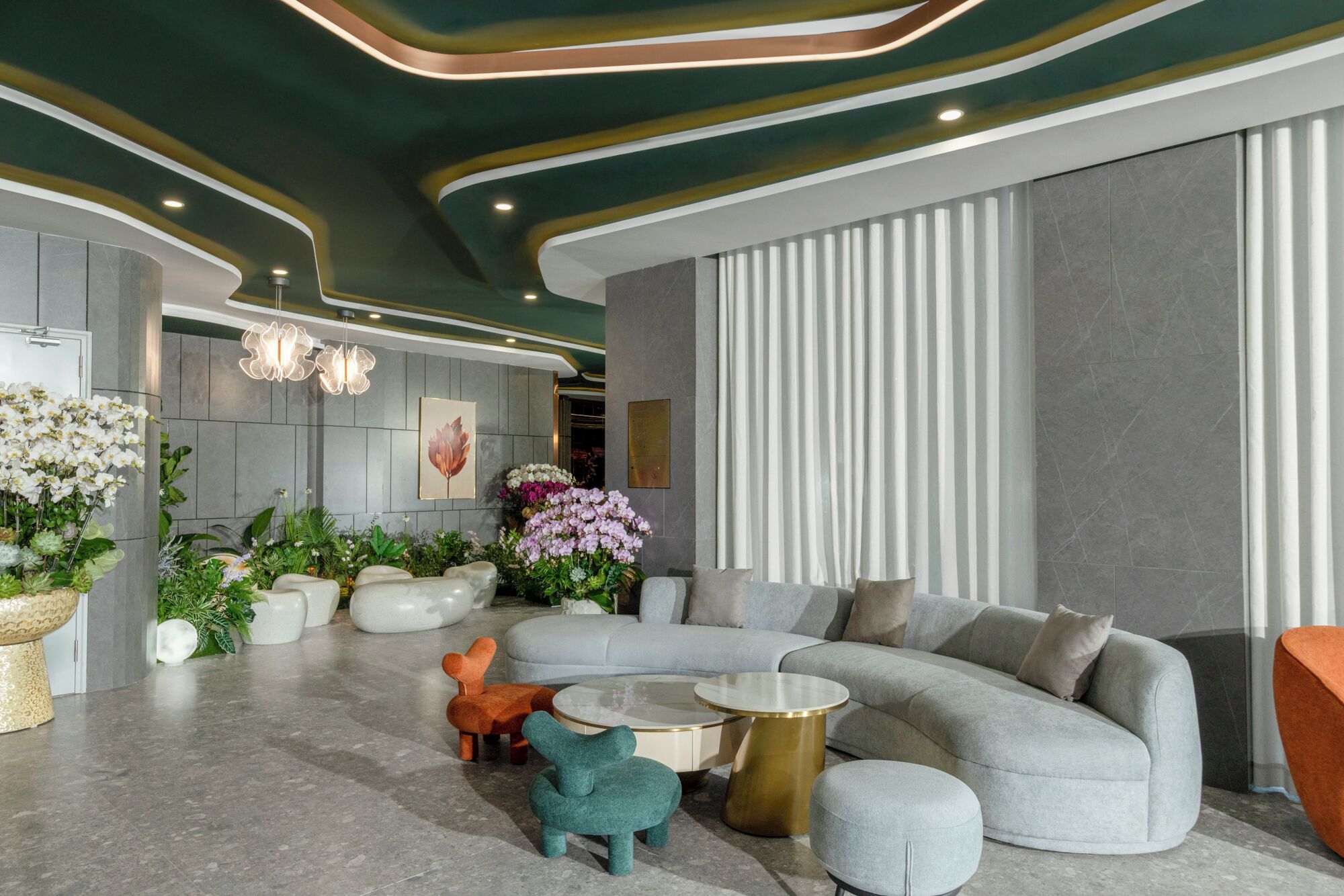 A modern interior with a curved sofa, round coffee table, and decorative chairs.