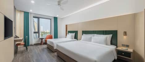 Deluxe Triple Room, City View | Minibar, in-room safe, blackout drapes, WiFi (free)