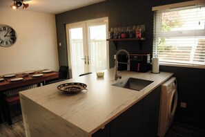 Fridge, microwave, oven, stovetop - Scenic 3BR Home with Sauna and Views (Warrenpoint, Newry)
