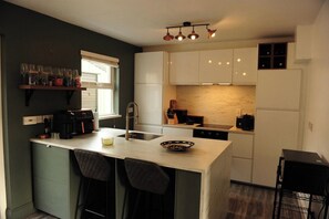 Fridge, microwave, oven, stovetop - Scenic 3BR Home with Sauna and Views (Warrenpoint, Newry)