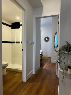 Shower, hair dryer, towels, shampoo