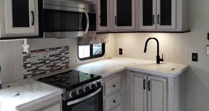 Private camper with full hook up walking distance to Martinsville Speedway