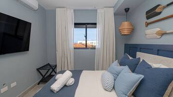 1 bedroom, desk, iron/ironing board, travel cot