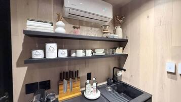 Fridge, microwave, toaster, cookware/dishes/utensils