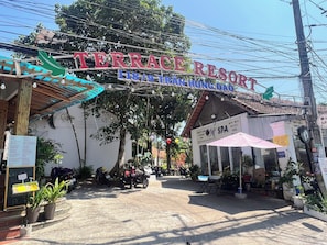 A sign for 'Terrace Resort' with a date and location, a spa, and a menu board. - Terrace Resort (Phu Quoc)
