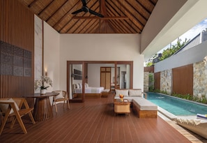 Villa Deluxe, piscina privada | Zona de estar | Smart TV de 43 pulgadas con canales digitales