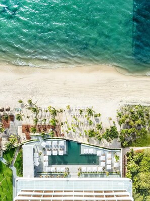 On the beach, sun-loungers, beach towels - Two Bedroom Suite at Hotel Mousai Cancun-Oceanview Luxury Retreat (Cancún)