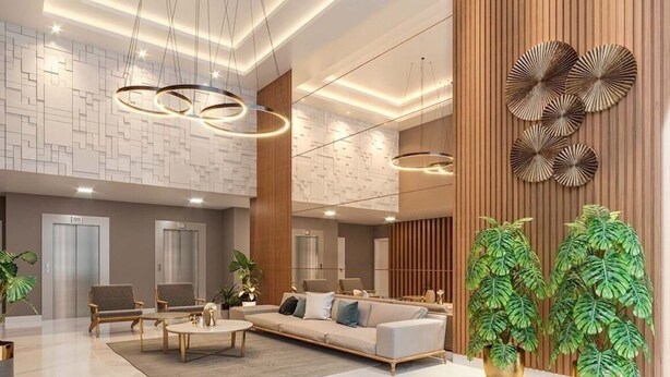 A modern lobby with a sofa, chairs, a coffee table, and a reception desk. - Fantastic Apartment by the Beach, 24/7 Security, Parking Garage (Vila Velha)