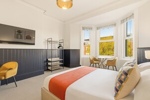 Deluxe Room | Desk, laptop workspace, iron/ironing board, free WiFi