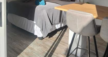 Cozy and stylish1-bedroom unit feature a comfortable double bed,bathroom,kitchen