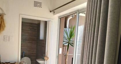 Cozy and stylish1-bedroom unit feature a comfortable double bed,bathroom,kitchen