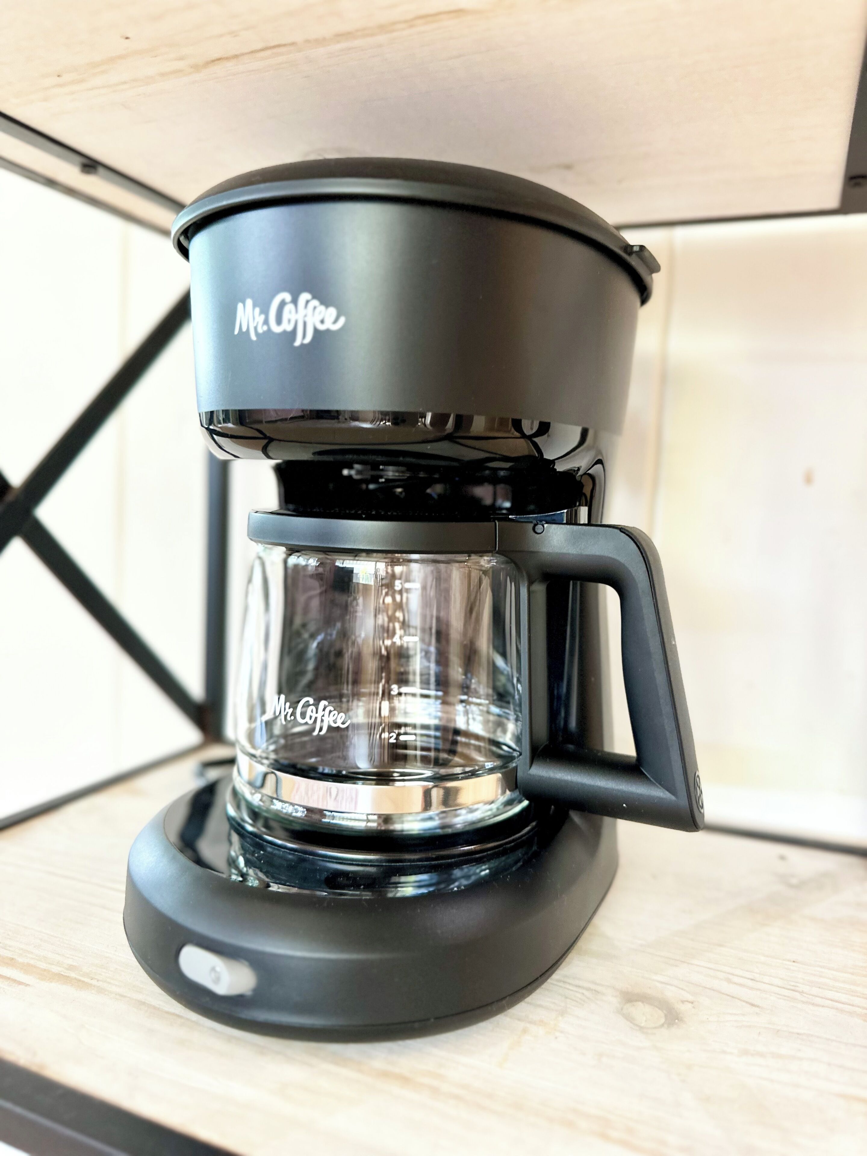 A Mr. Coffee coffee maker on a kitchen counter.