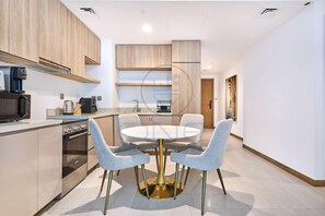 Fridge, microwave, oven, stovetop - Premium 2BR Apartment at Urban Oasis, Business Bay (Location link: https://maps.app.goo.gl/NoPWN6k2sTa6JpQZ6)