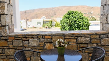 Comfort Quadruple Room, Balcony, Garden View | Outdoor dining