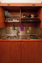 Comfort Double Room, Balcony, Garden View | Private kitchen | Fridge, stovetop, cookware/dishes/utensils