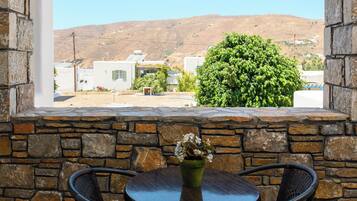 Comfort Quadruple Room, Balcony, Garden View | Outdoor dining