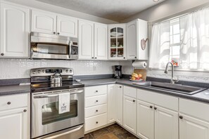 Fridge, microwave, stovetop, dishwasher - Unique Family Home on Working Ranch in Henderson! (Henderson)