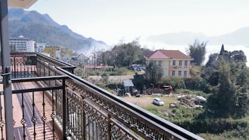 Family Triple Room, Balcony, Mountain View | Property grounds