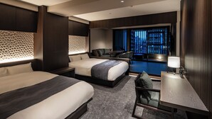 A modern hotel room with two beds, a desk, a chair, a pool view, and a balcony. - KOHAKU Apartment Hotel Kyoto (Kyoto)