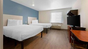 A hotel room with two beds, a desk, a television, and a window with blinds. - 2 Queen Beds |Non-Smoking, Kitchen (El Paso TX)