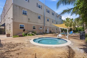 Pool - Elegant 2BR on Frenchmen Street with shared pool, hot tub, and easy walk to the French Quarter. (New Orleans)