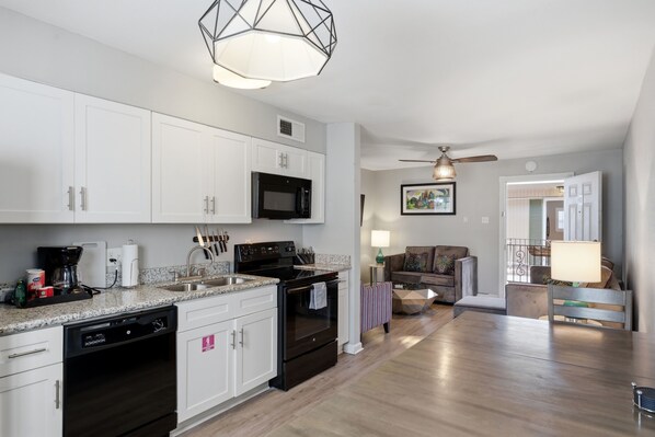 Private kitchen - Stylish 2BR on Frenchmen Street with shared pool, hot tub, and easy walk to the French Quarter. (New Orleans)