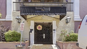 A building with a black awning displaying 'FRENCHMEN ORLEANS at 519'. - 2BR near Frenchmen Street with shared pool, hot tub, and easy walk to the French Quarter. (New Orleans)