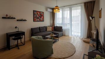 Leilighet – deluxe, byutsikt | Oppholdsområde