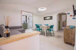 TV - GuestHost - Cozy and bright 70 square meters apartment, perfect for four people, located on the first floor of a building without an elevator.The property enjoys an excellent location, in an extremely quiet area and just 250 meters from the seafront. Ame (Cannigione)