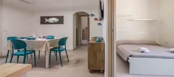 GuestHost - Cozy and bright 70 square meters apartment, perfect for four people, located on the first floor of a building without an elevator.The property enjoys an excellent location, in an extremely quiet area and just 250 meters from the seafront. Ame