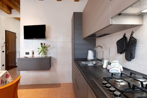 Geladeira, fogão, cooktop, cafeteira/chaleira
