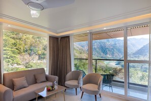 Suite, Balcony, Mountain View | Minibar, in-room safe, desk, laptop workspace