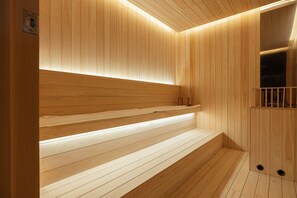 A wooden sauna with benches and a small shelf. - LOOP Seoul Hotel Retreat by Anook Seoul Gangnam 1 (Seoul)