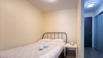 Deluxe-Suite, Mehrere Betten | Wohnbereich