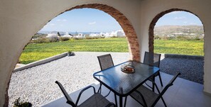 Outdoor dining - Etherio Naxos Thalassa Cozy 2-bedroom apartment in charming Naxos with AC (Naxos)