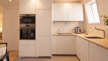 Leilighet – superior, byutsikt | Eget kjøkken