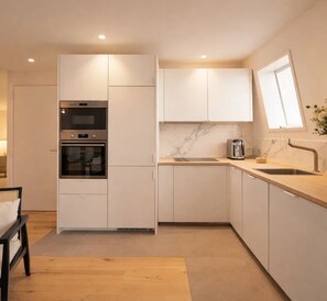 Leilighet – superior, byutsikt | Eget kjøkken