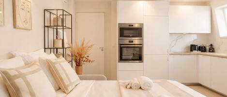 Appartement Supérieur, vue ville | Coin séjour